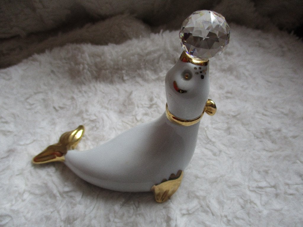 Capodimonte Zeehond met Kristallen Bal - Porselein, Ophalen of Verzenden, Zo goed als nieuw, Dier