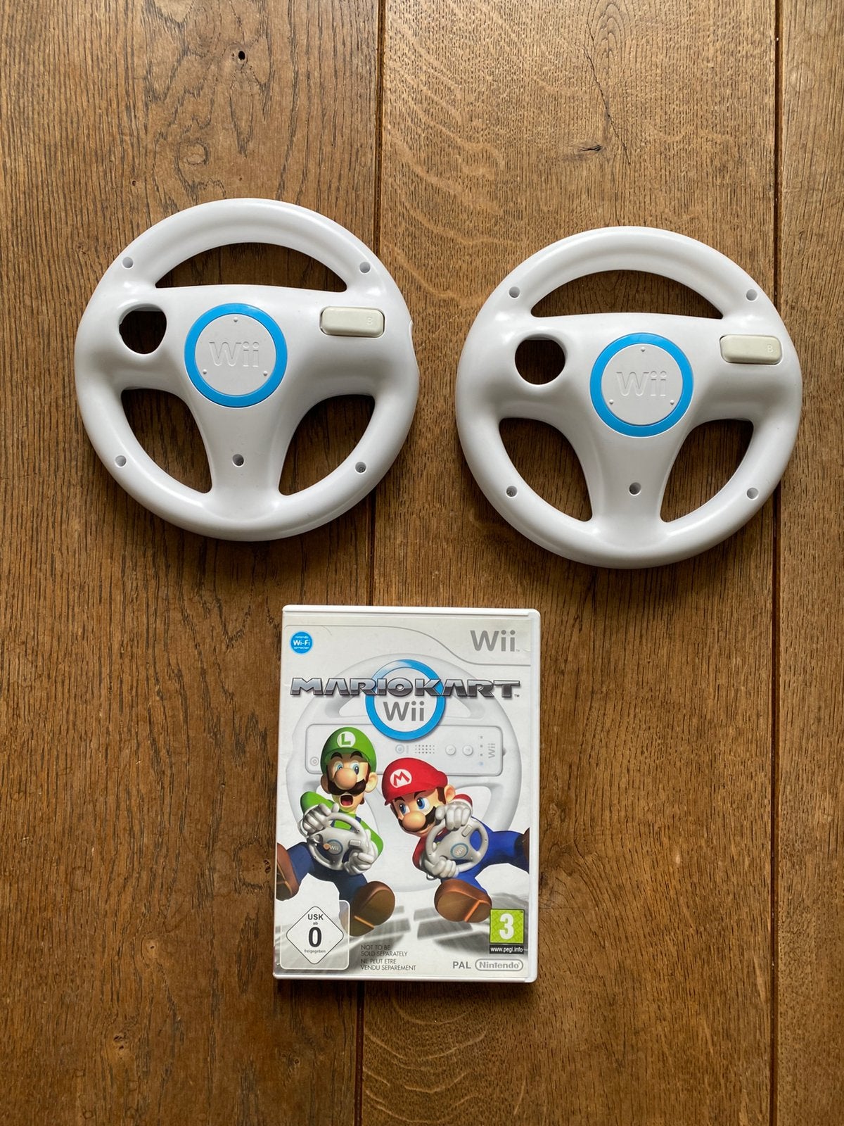 Mario Kart Wii + 2 originele stuurtjes, Computers en Software, Ophalen of Verzenden, Zo goed als nieuw