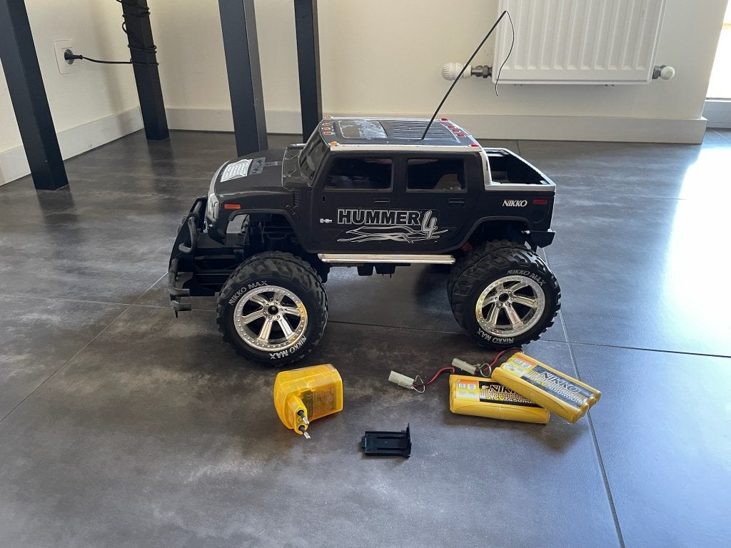 Nikko Hummer H2 RC monstertruck met accu's en lader, Ophalen of Verzenden, Gebruikt, Overige schalen, Auto offroad