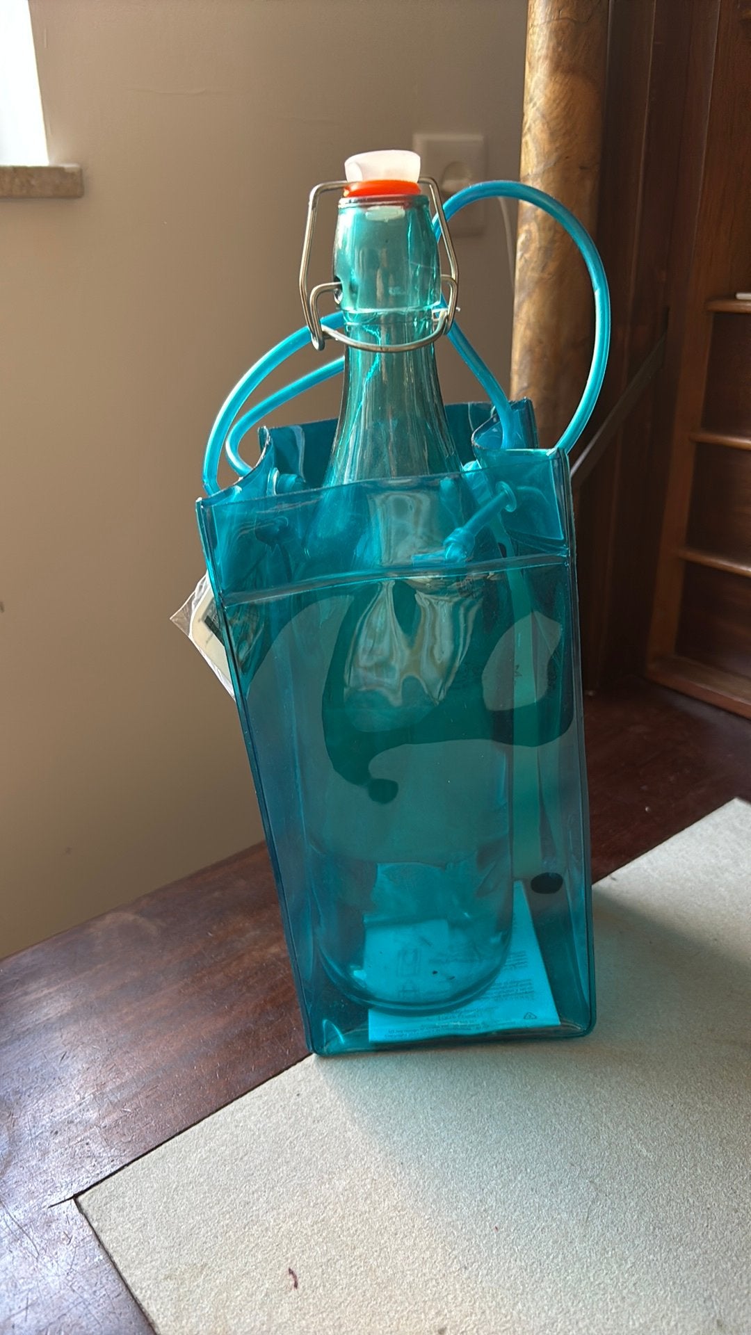 Glazen fles in plastic tas, Ophalen of Verzenden, Zo goed als nieuw
