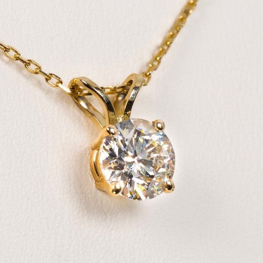 Gouden ketting met natuurlijke diamant (0,66 ct), Ophalen of Verzenden