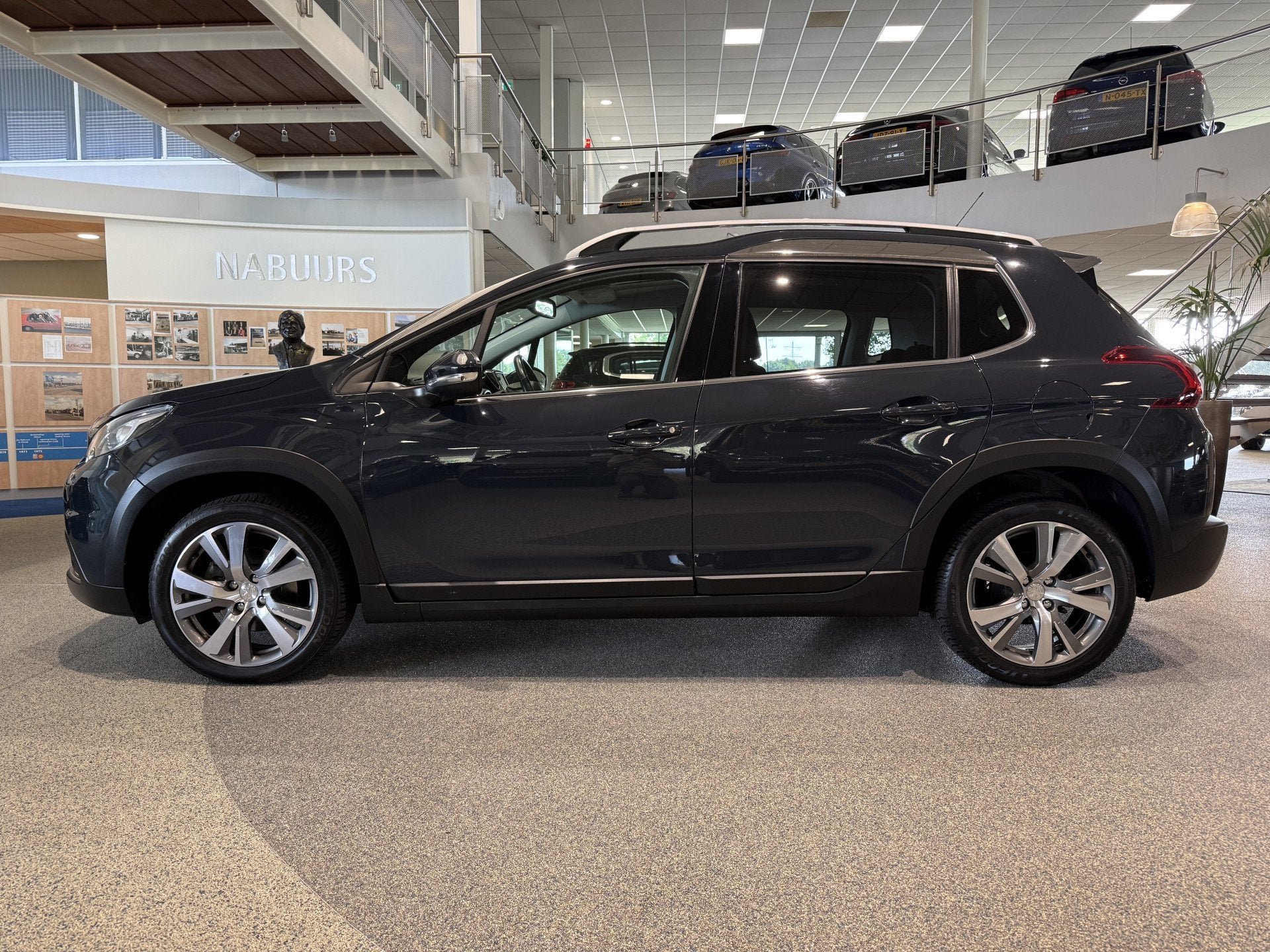 Peugeot 2008 1.2 110pk EAT6 BL Allure NL auto, Trekhaak, Pan, Auto's, 12 maanden, Euro 6, 1199 cc, Leder en Stof