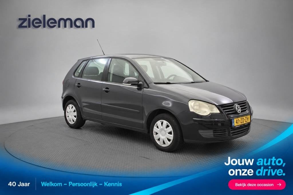 Volkswagen POLO 1.4 16V Optive - Airco, Nieuwe APK!, Huisgarantie, 4 cilinders, Met garantie (alle), Zwart
