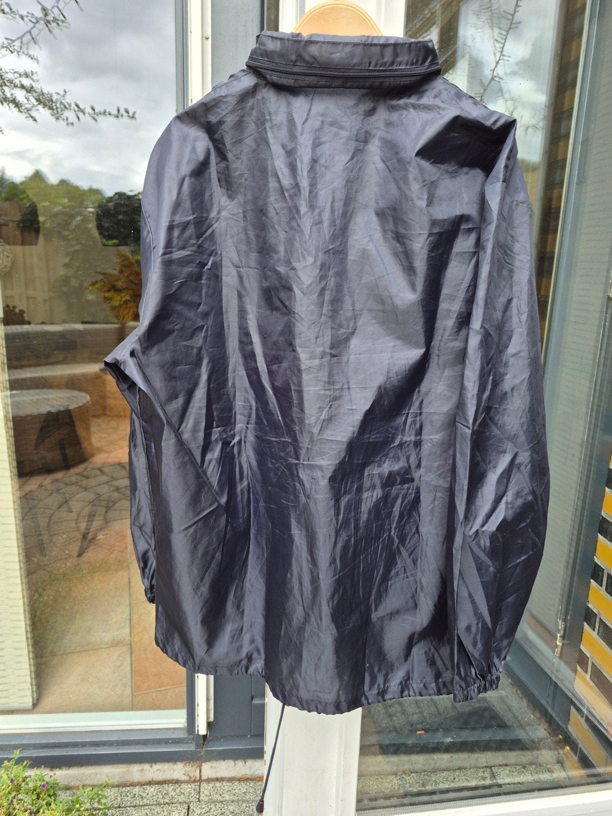 Donkerblauwe regenjas - Maat XL, Ophalen of Verzenden, Nieuw