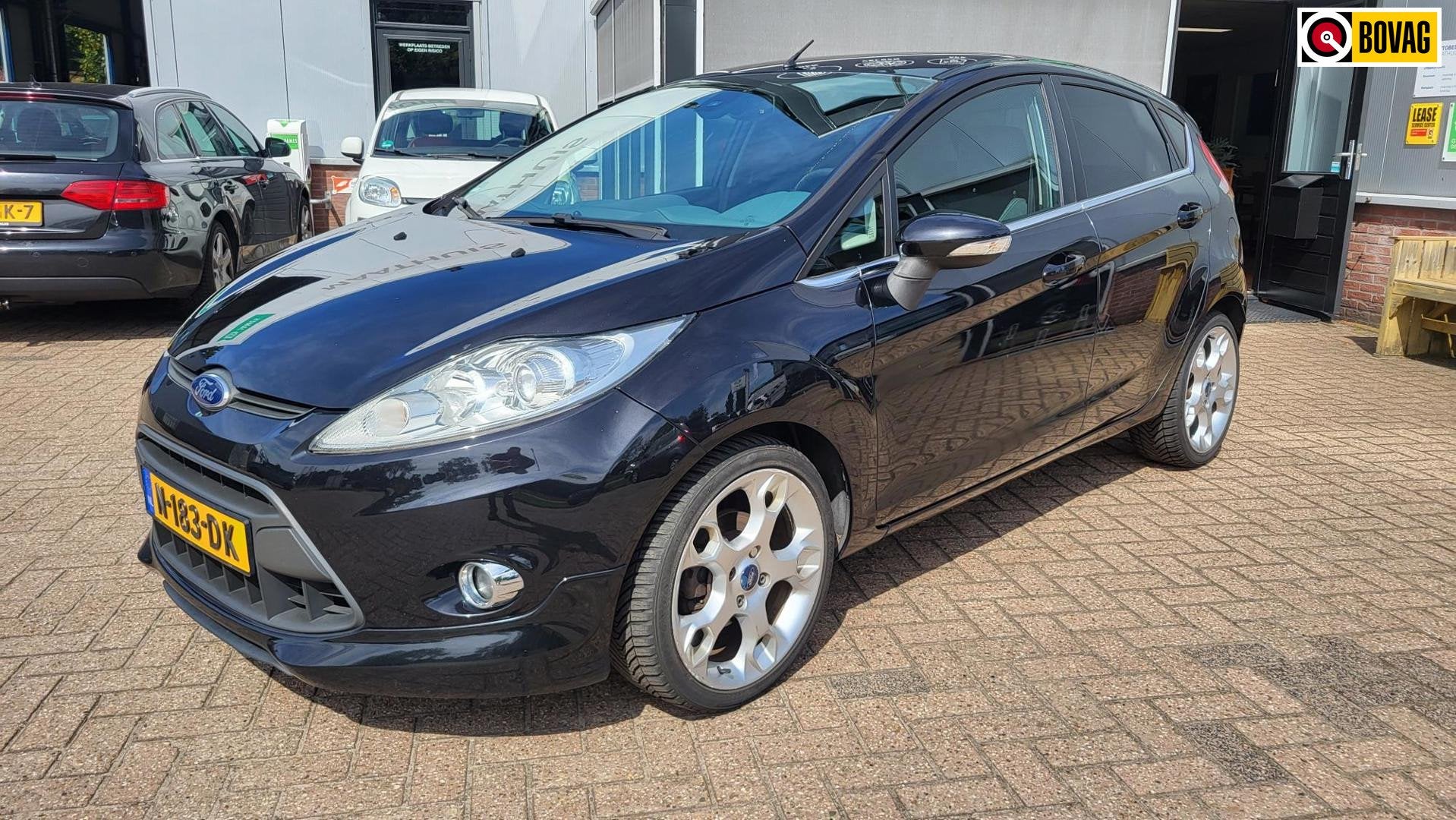 Ford Fiesta 1.6 Ghia 5 deurs, Auto's, Voorwielaandrijving, Stof, Elektrische ramen, Zwart