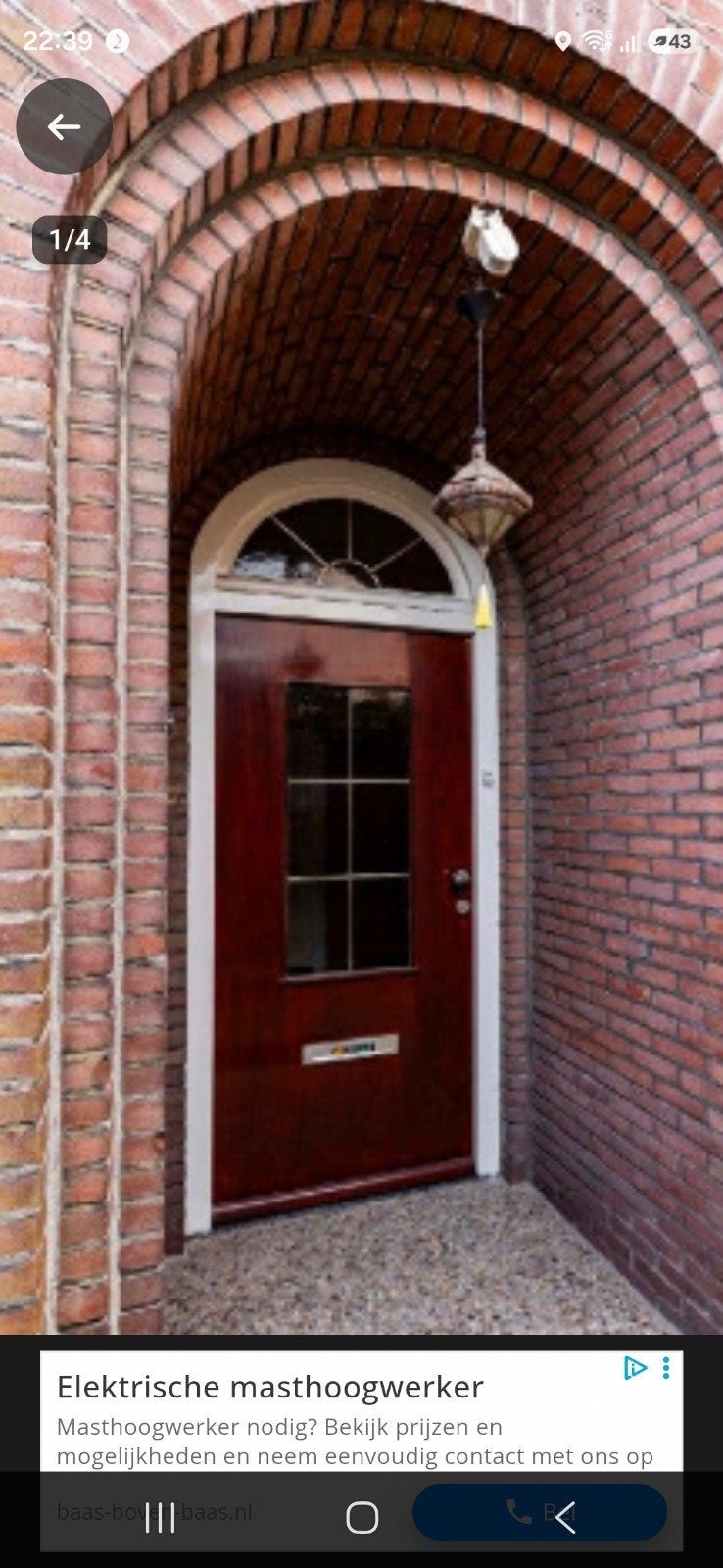 klassieke voordeur met bovenlicht glas in messing uit 1938, Ophalen