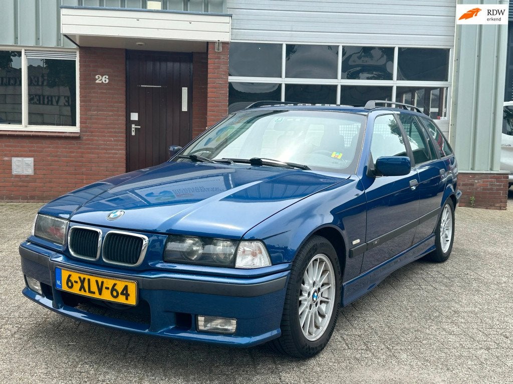 BMW 3-serie Touring 328i Sport Edition, Auto's, Achterwielaandrijving, Gebruikt, 1340 kg, Blauw