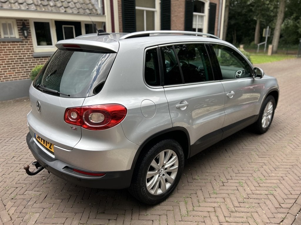 Volkswagen Tiguan 1.4 TSI 122pk Sport&Style Navi, Trekhaak,, Auto's, Euro 5, Gebruikt, 4 cilinders, Origineel Nederlands