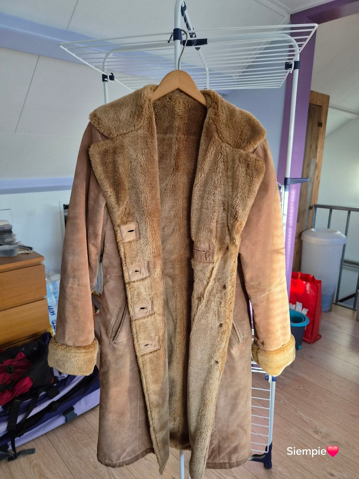 Lange dames jas, valt kleiner, met draagsporen, Ophalen
