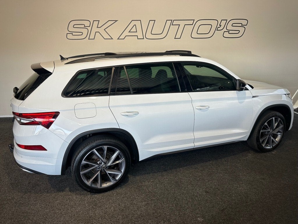Skoda KODIAQ 1.5 TSI SP. BNS. 7P. NAP l MEMORY l ELEK TREKH, Auto's, Skoda, Euro 6, 4 cilinders, 7 stoelen, Wit