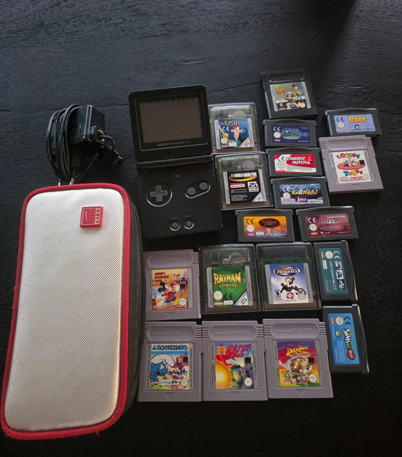 Gameboy Advance SP met 18 spellen en toebehoren, Ophalen of Verzenden, Gebruikt, Game Boy Advance SP, Met beschermhoes of tas