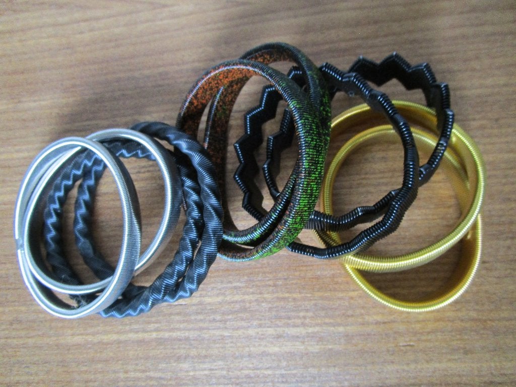 Nr.154: Mouwophouders 5 verschillende kleuren en vormen, Ophalen of Verzenden, Zo goed als nieuw