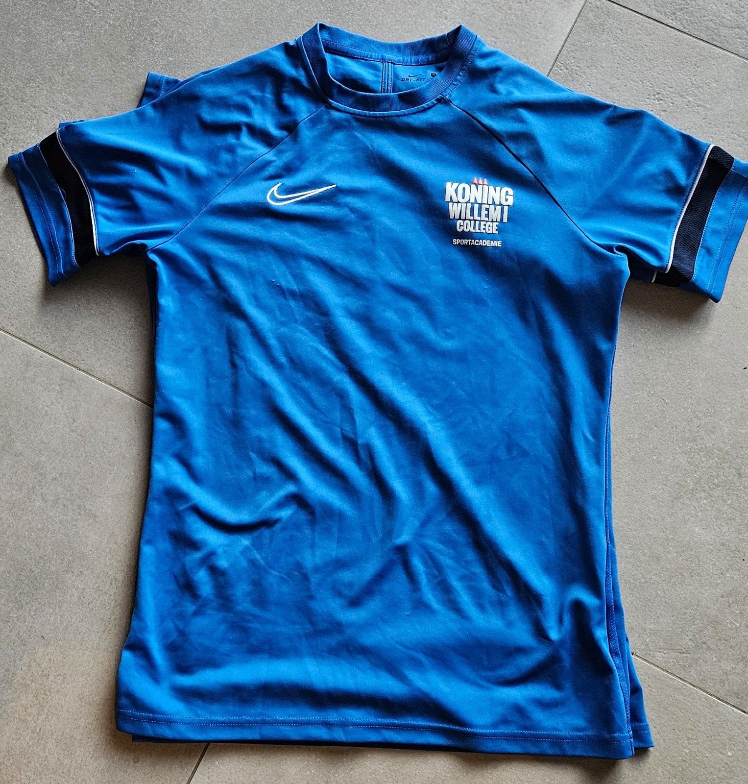 Sportshirt Koning Willem 1 College sportacademie, Ophalen of Verzenden, Nieuw, Blauw, Algemeen