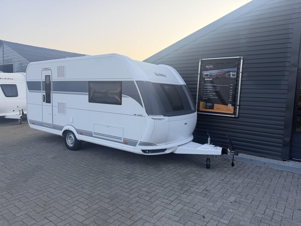 Hobby De Luxe 460 SL, 2026 enkele bedden, zw as, sfeerverlic, Caravans en Kamperen, Caravans, Schokbreker, Hobby, Bedrijf, Treinzit