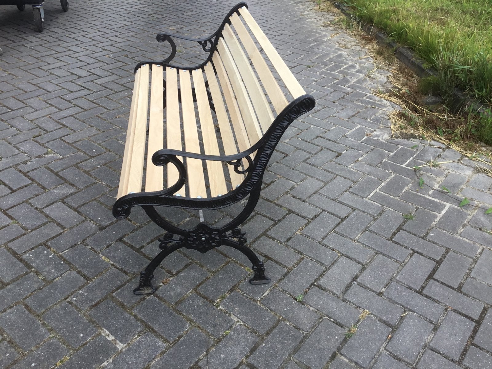 Nieuwe eikenhouten tuinbank met gietijzeren poten 125 cm, Ophalen, Nieuw, Hout