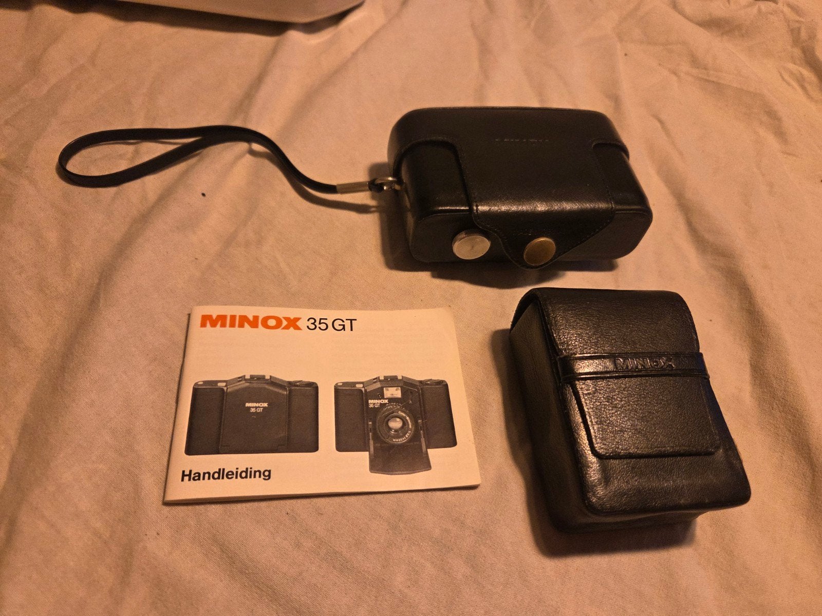 Minox 35 Gt met flitser, gebruiksaanwijzing,leren tassen, Audio, Tv en Foto, Fotocamera's Analoog, Ophalen of Verzenden, Compact
