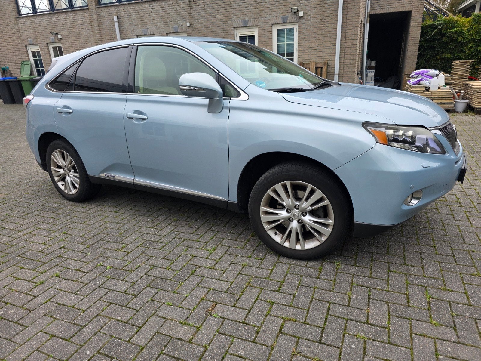 Lexus RX(-H) 450h Hybrid 299pk CVT 2009 Blauw, Auto's, Automaat, 249 pk, Beige, 2000 kg