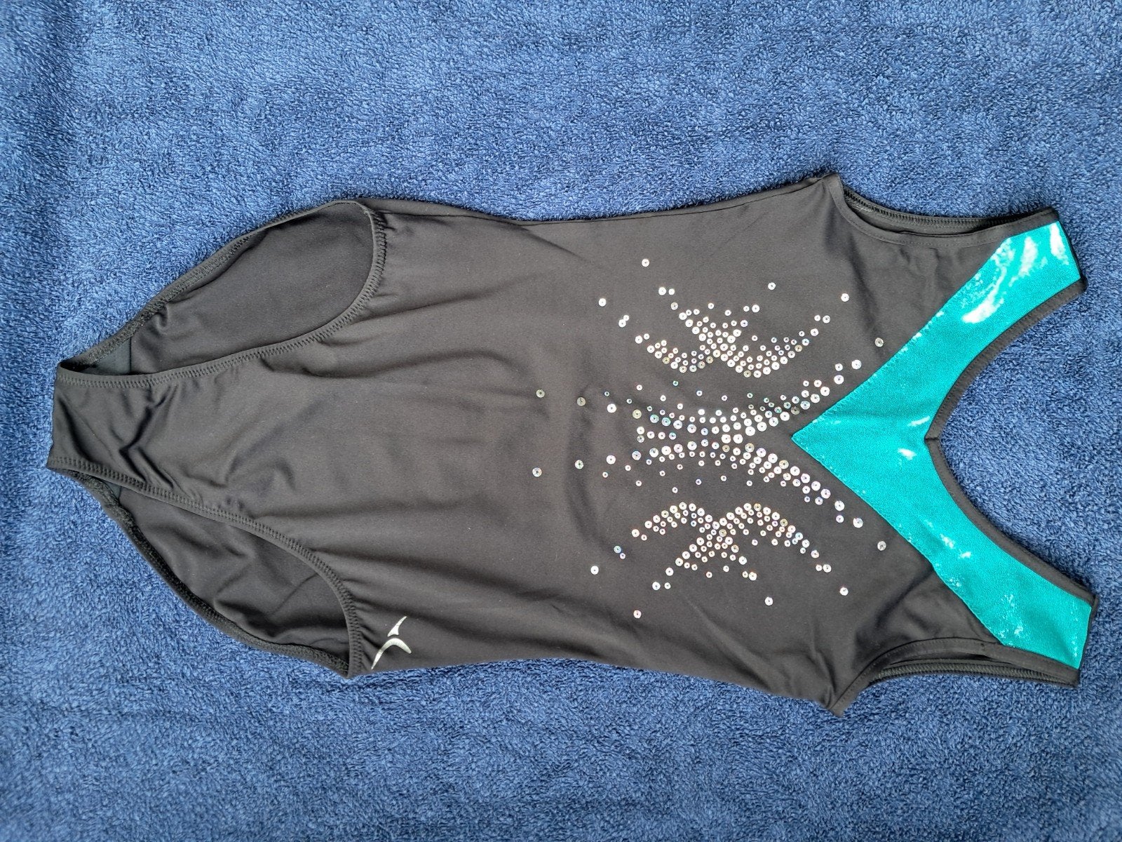 Turnpakje met glitters en turquoise accent, Ophalen, Zwart, Overige typen, Kindermaat 122 t/m 140