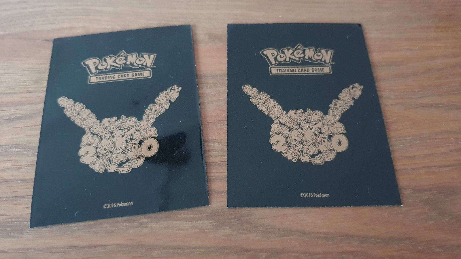 Pokémon 20th Anniversary Pikachu Card Sleeves (2 stuks), Ophalen of Verzenden, Zo goed als nieuw, Sleeves of Kaarthoesjes
