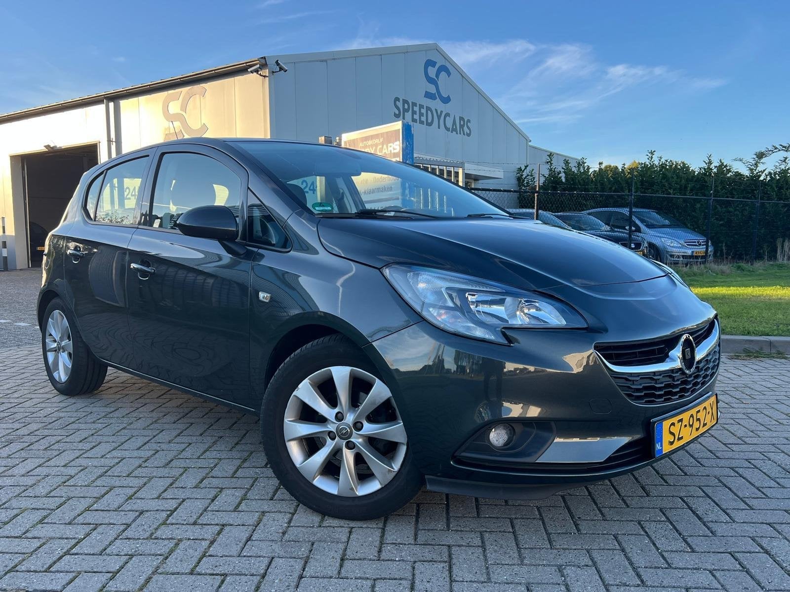 Opel Corsa 1.4 120 Jaar Edition LPG G3 5DRS Cruise Navi PDC, Auto's, Voorwielaandrijving, Stof, Gebruikt, 4 cilinders