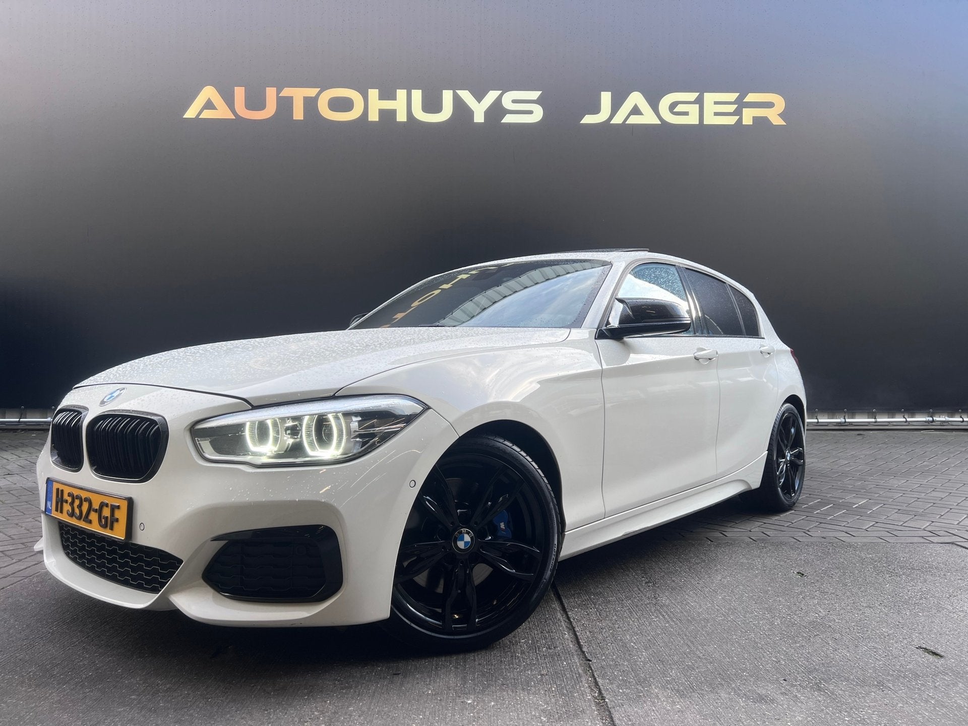 BMW 1-serie M140i High Executive Schuifdak h&K Leer Performa, Auto's, BMW, Dealer onderhouden, Achterwielaandrijving, Gebruikt