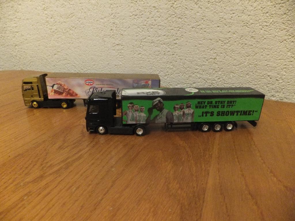 Twee model vrachtwagen met reclame van Dr. Oetker en Axe, Ophalen of Verzenden, Zo goed als nieuw