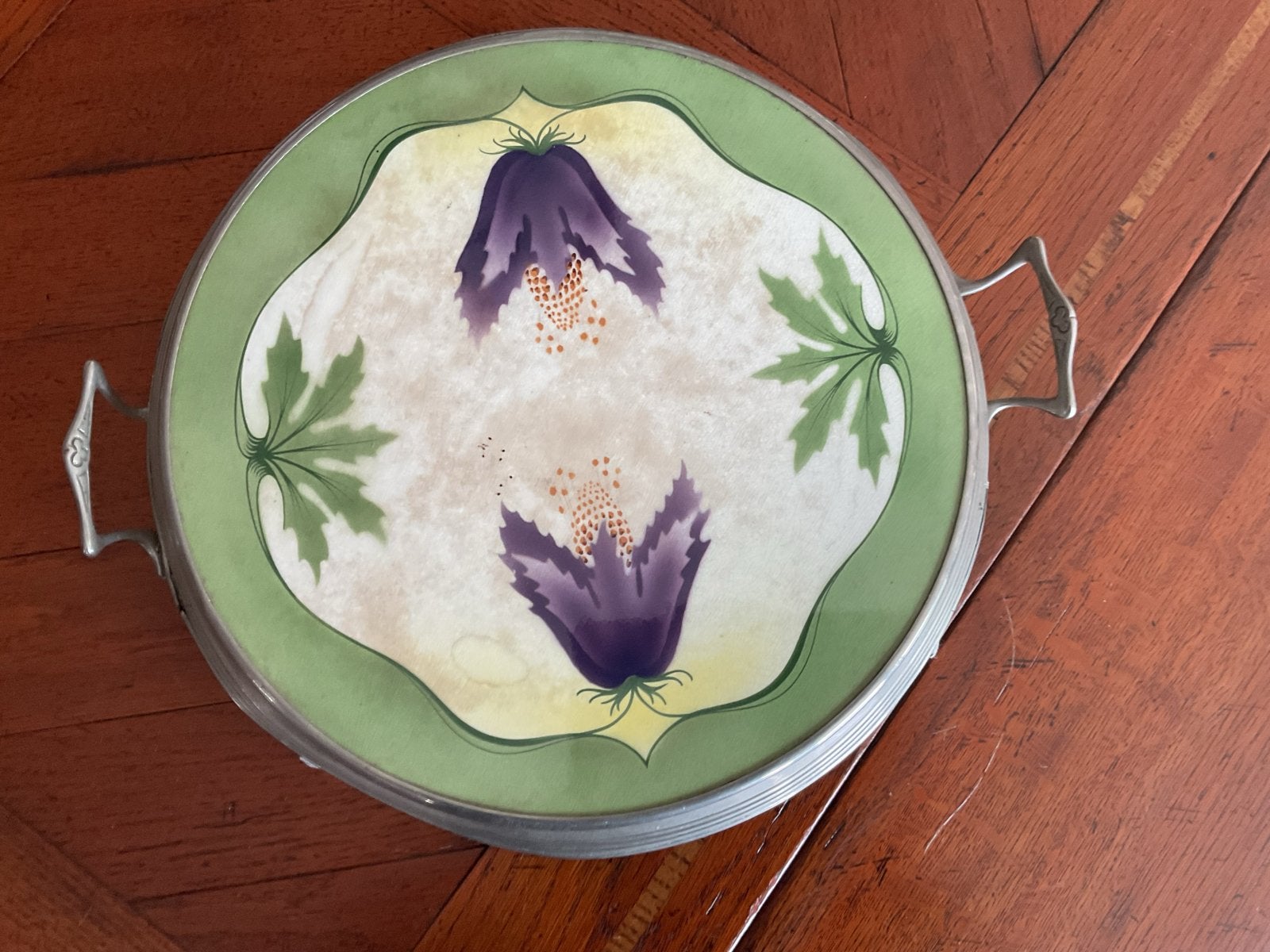 Antieke onderzetter met art nouveau decoratie, Ophalen