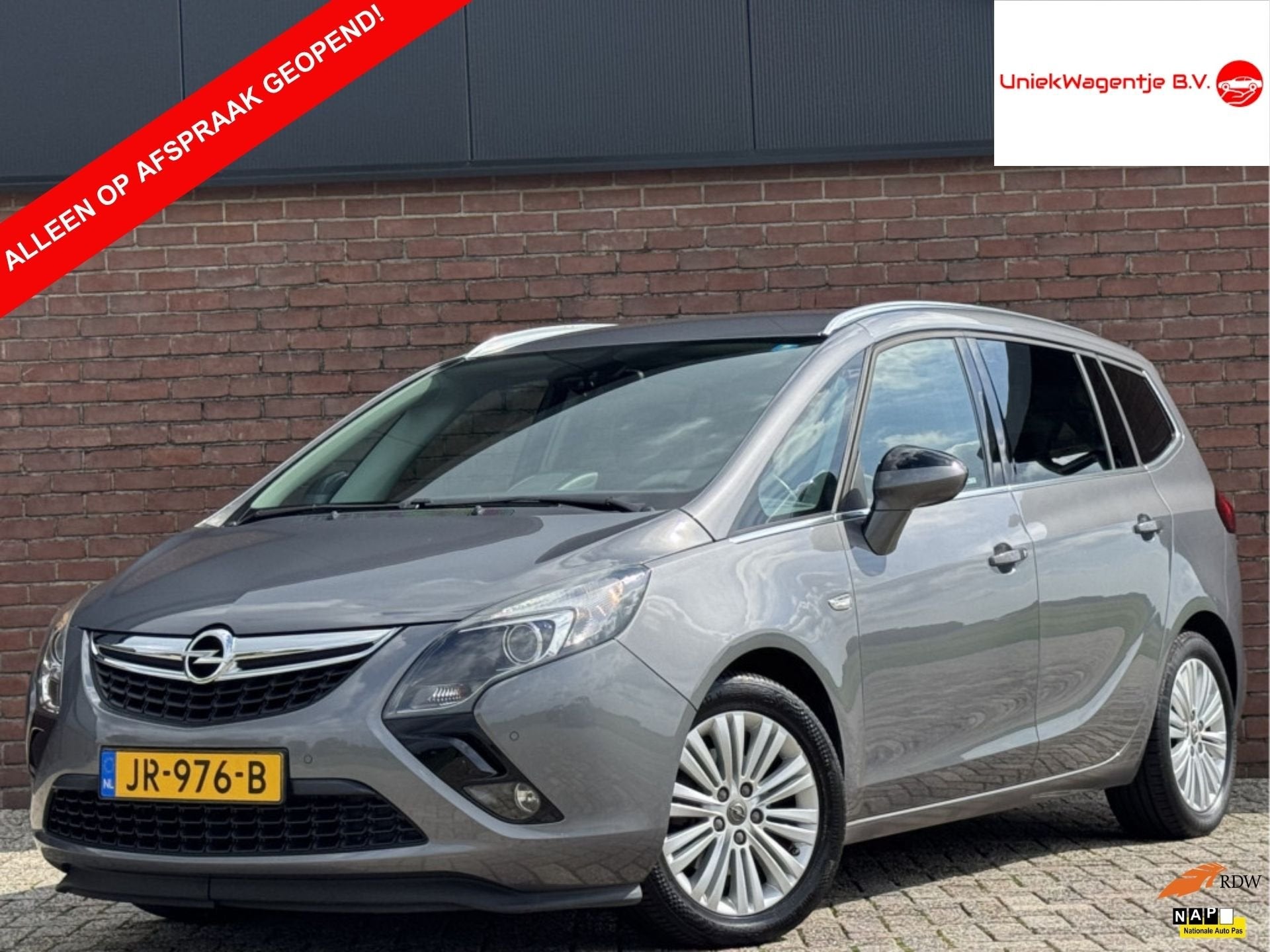 Opel Zafira Tourer 1.4 EDITION 7P. | NL-AUTO! | NAVI!, Auto's, Stof, Gebruikt, 4 cilinders, 7 stoelen