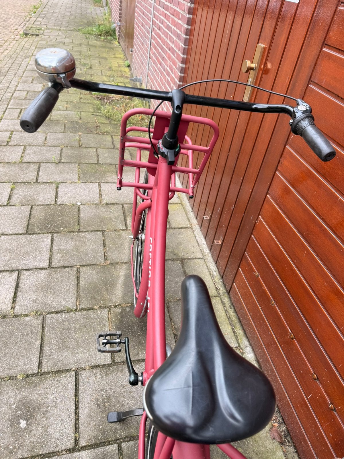 Cortina roze damesfiets