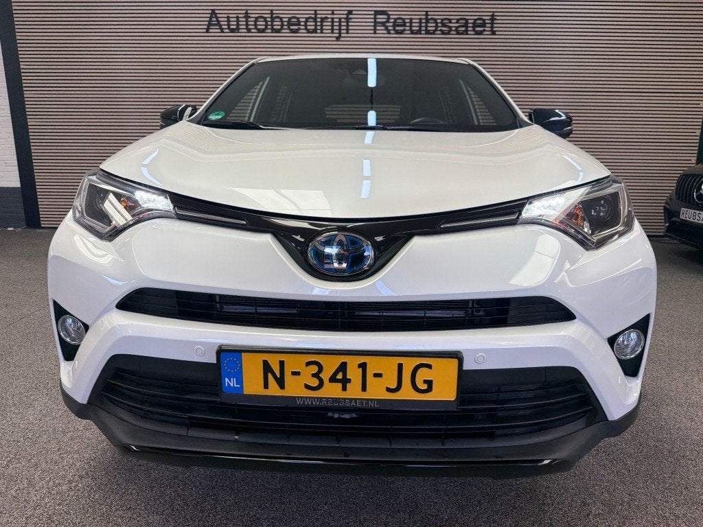 Toyota RAV4 2.5 Hybrid AWD Dynamic Panodak Acc Navi Trekhaak, Automaat, Gebruikt, 1650 kg, Wit
