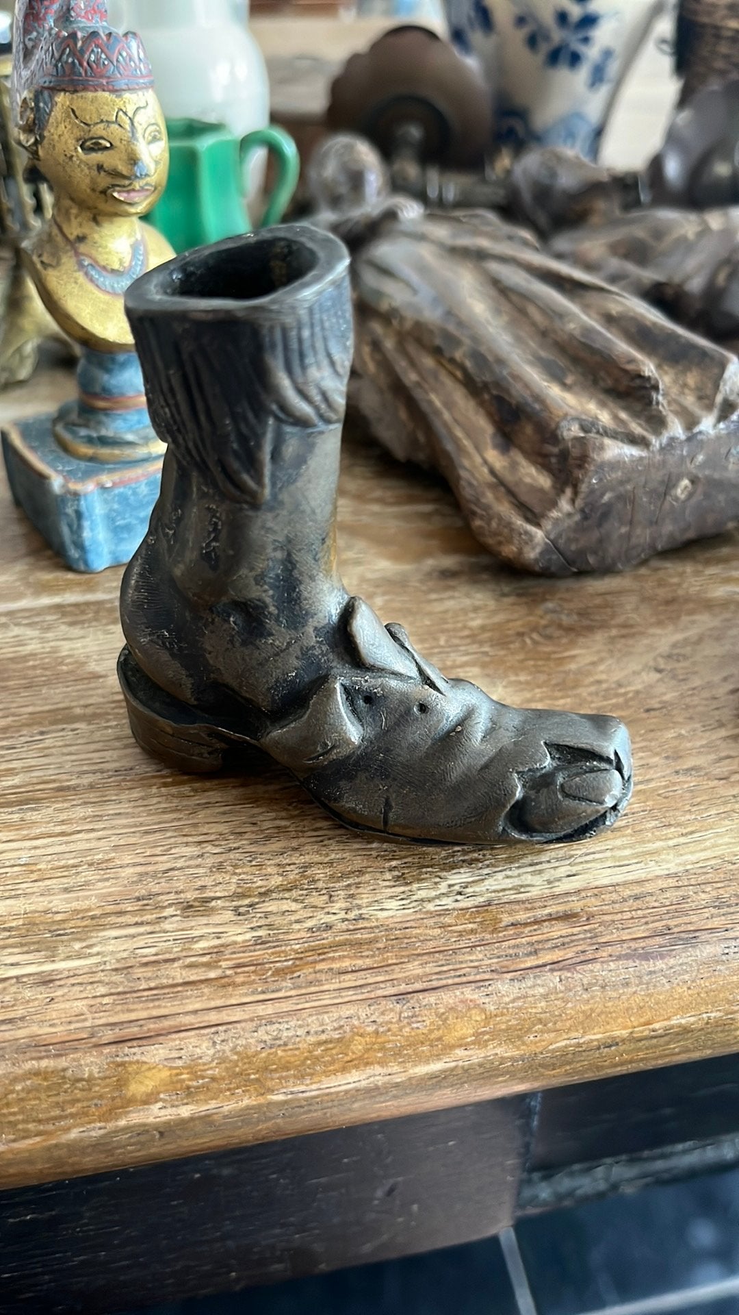 bronzen wandelstokknop in de vorm van versleten schoen