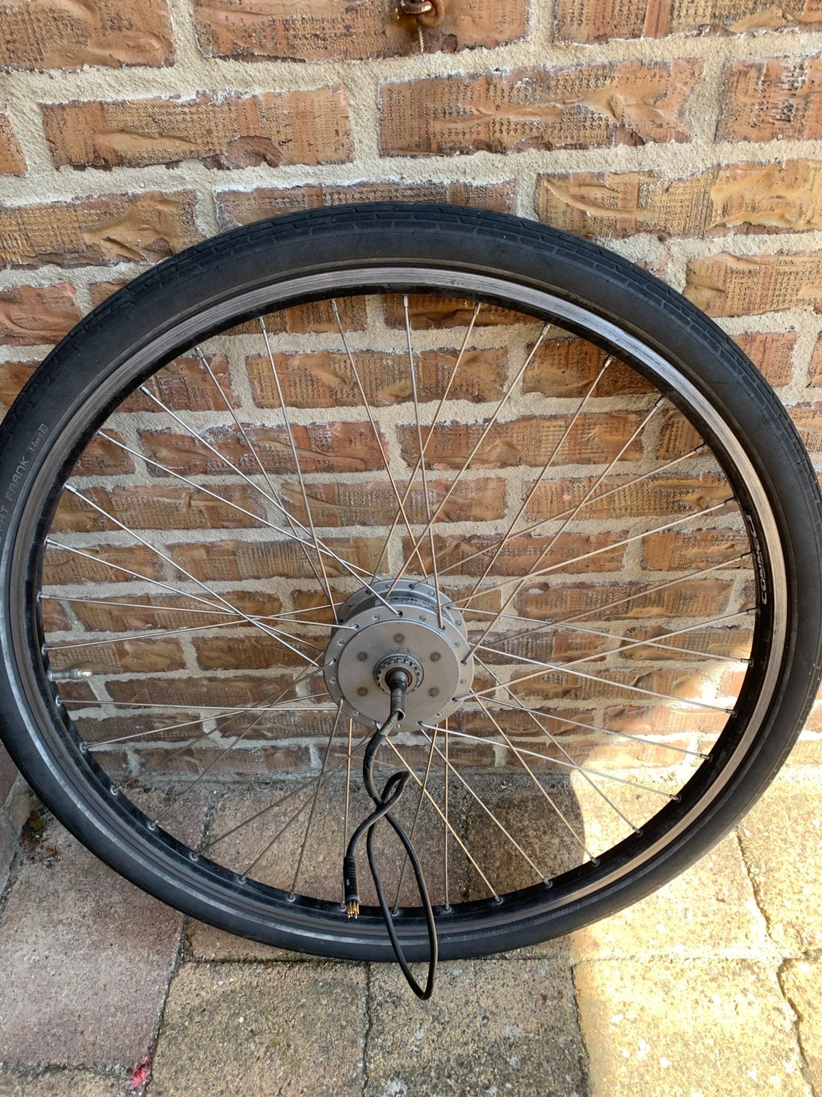 E bike voorwiel met 36 V motor  28” met 9 pol. stekker., Ophalen of Verzenden, Zo goed als nieuw, Motor
