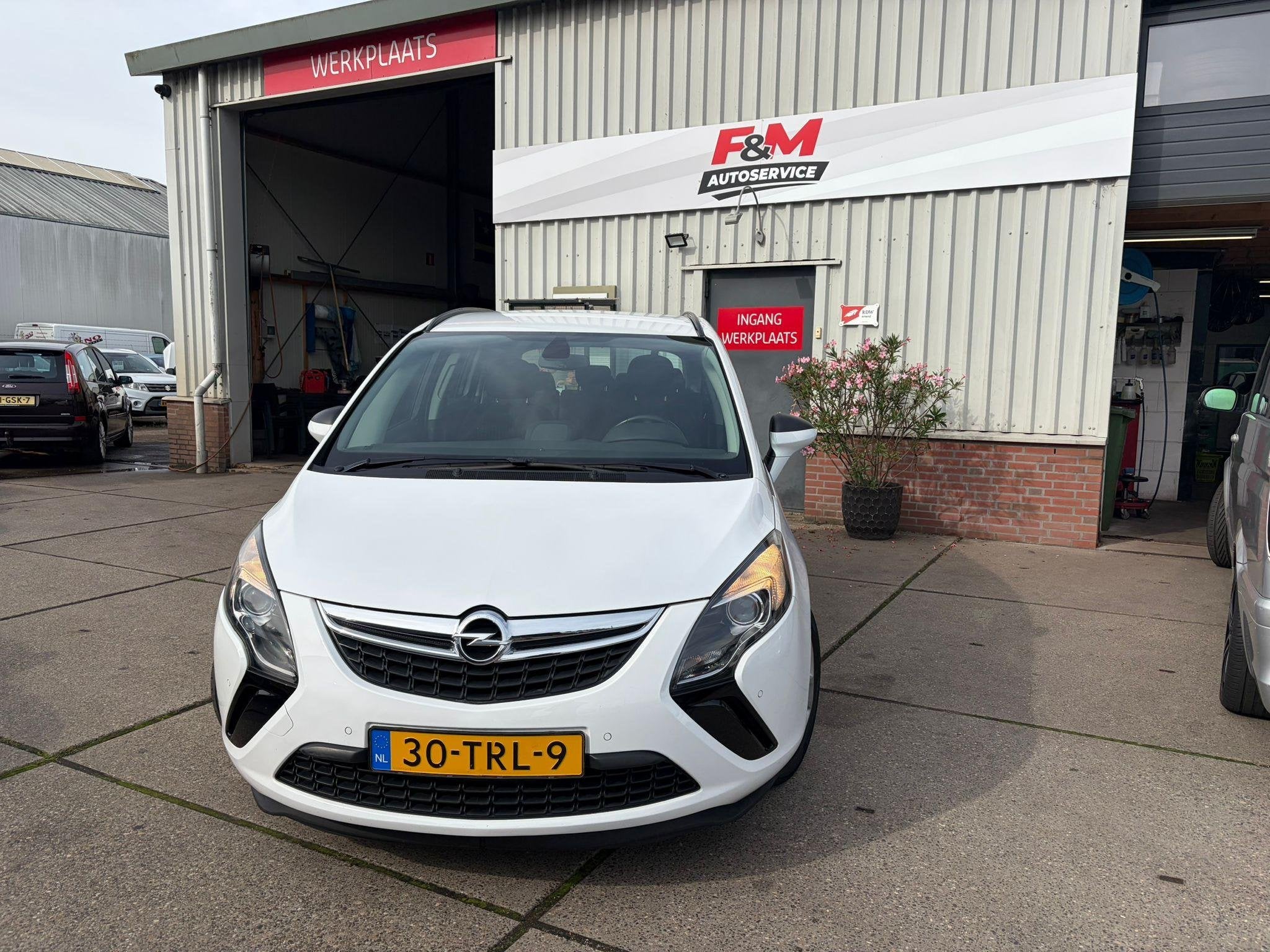 Opel Zafira Tourer 1.4 Edition 5p Automaat, Clima, cruise, p, Auto's, Euro 5, Stof, Zwart, 4 cilinders