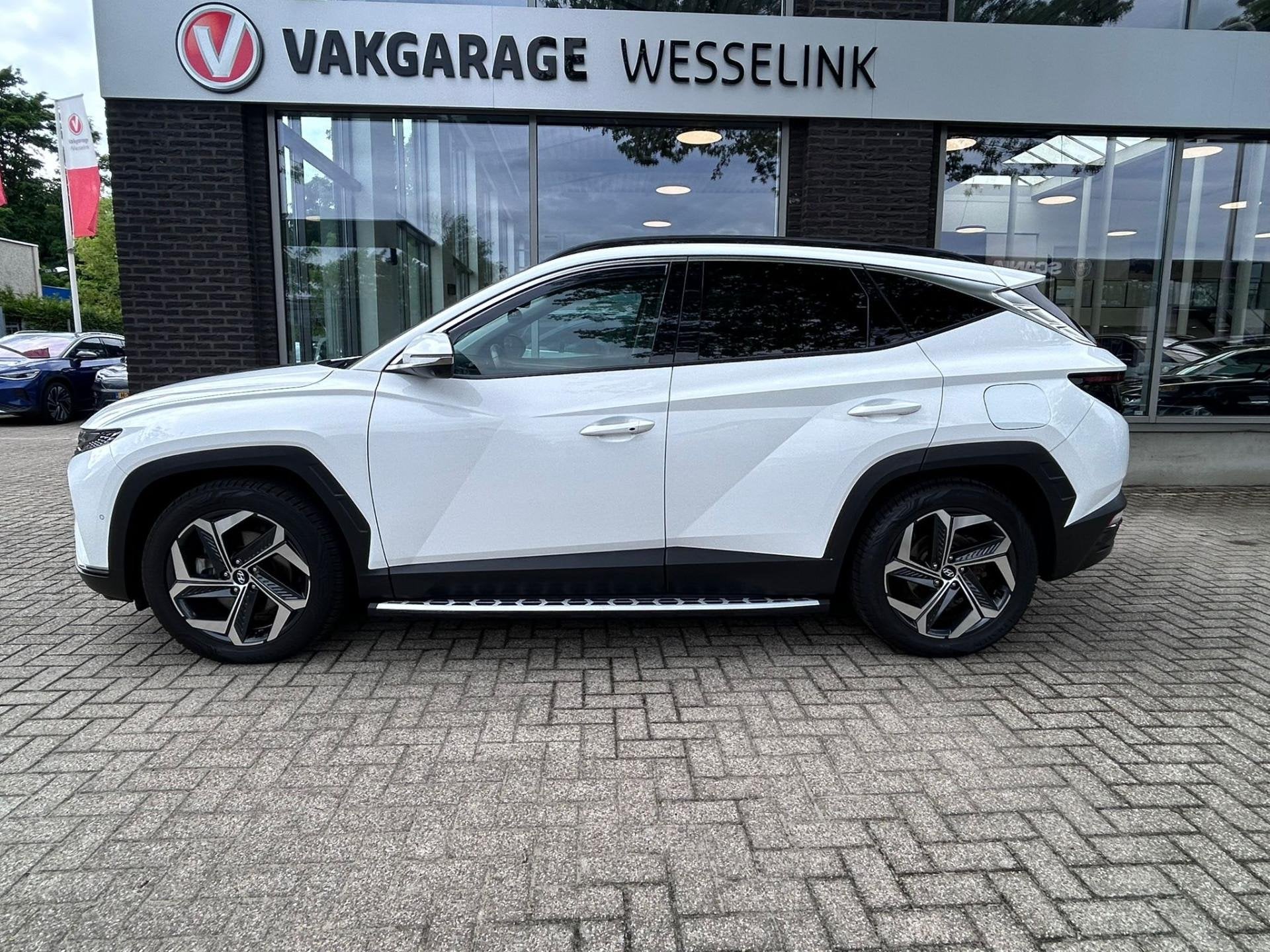 Hyundai Tucson 1.6 T-GDI PHEV Premium Sky 4WD | Panorama | L, Auto's, 1350 kg, Gebruikt, 4 cilinders, Wit