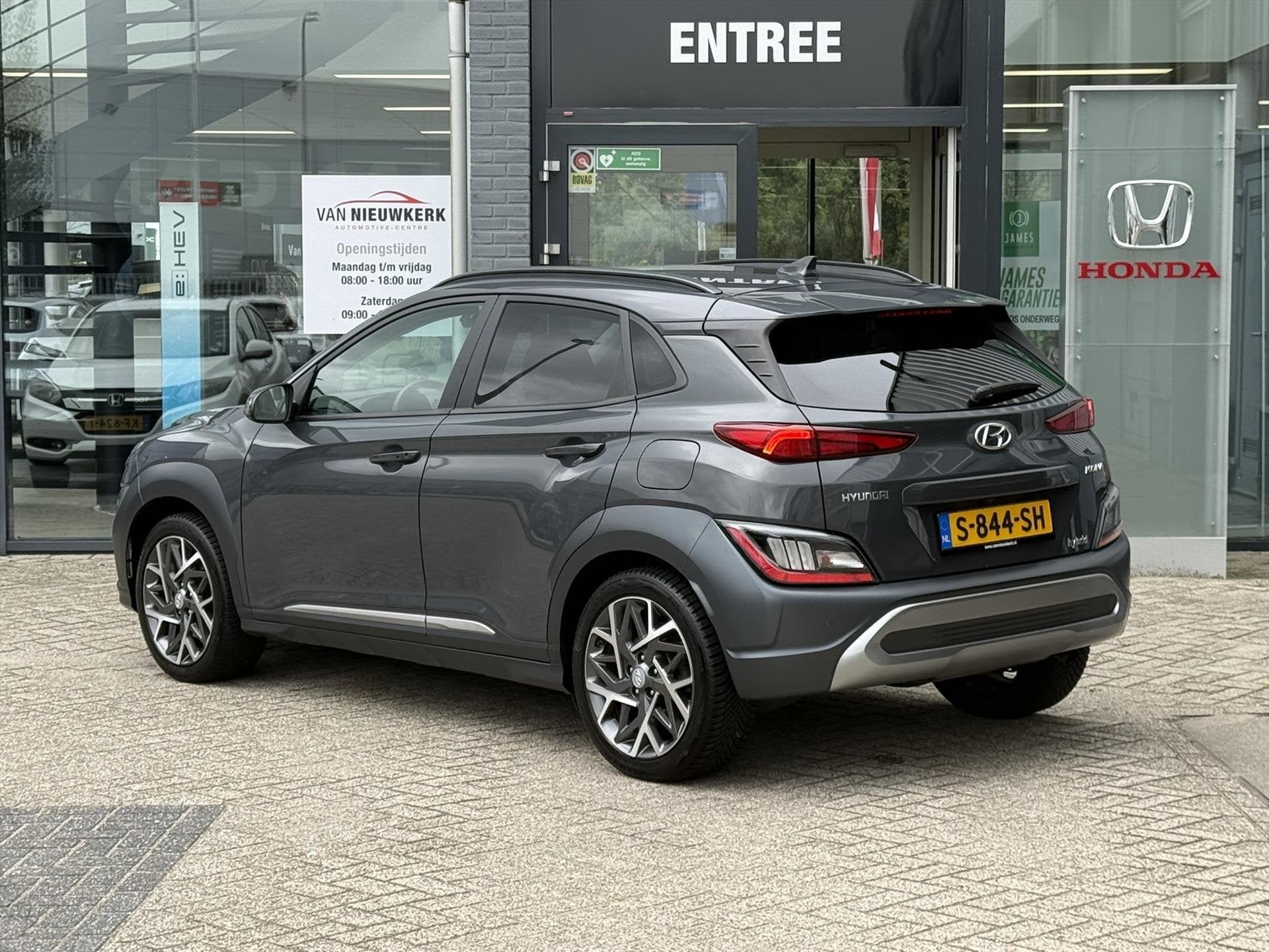 HYUNDAI Kona 1.6 GDI Hybrid 141pk automaat Premium | Leer |, Auto's, Automaat, Gebruikt, Automatische klimaatregeling, SUV of Terreinwagen