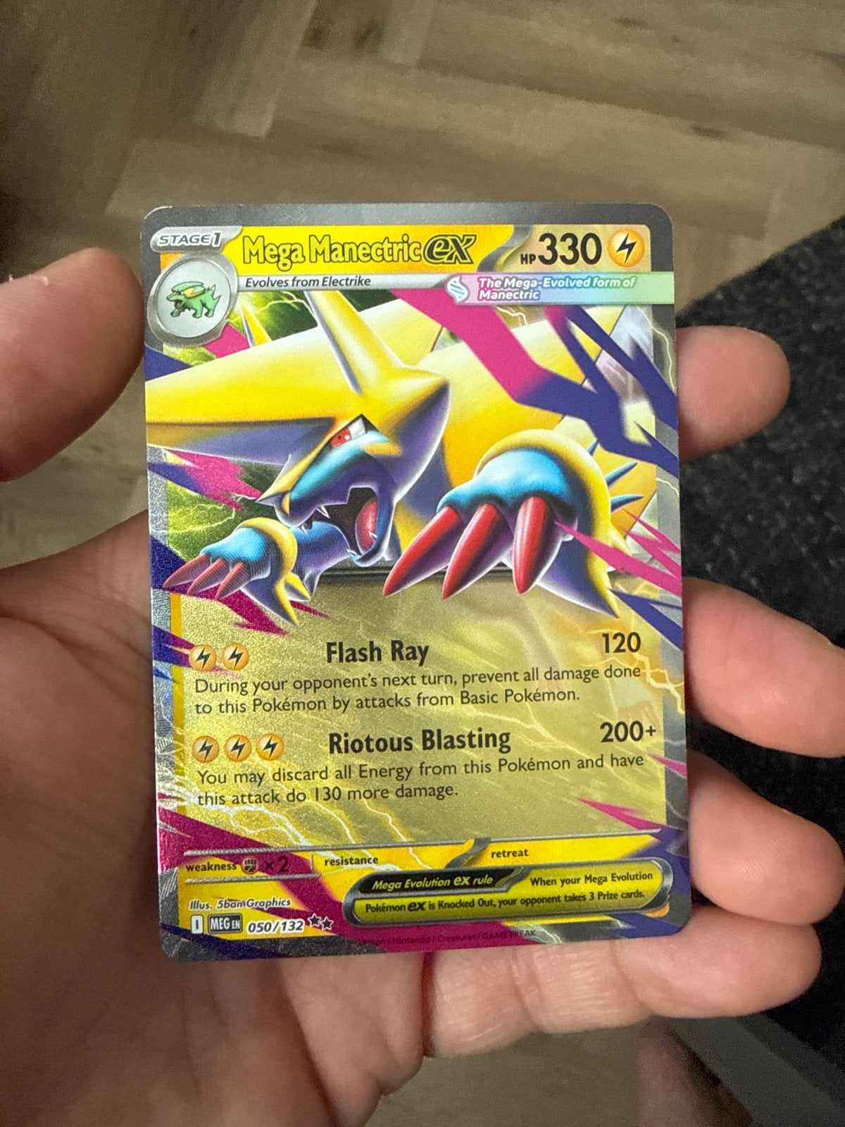 Mega Manectric EX Pokémon Kaart - Foil 050/132, Ophalen of Verzenden, Zo goed als nieuw, Losse kaart, Foil