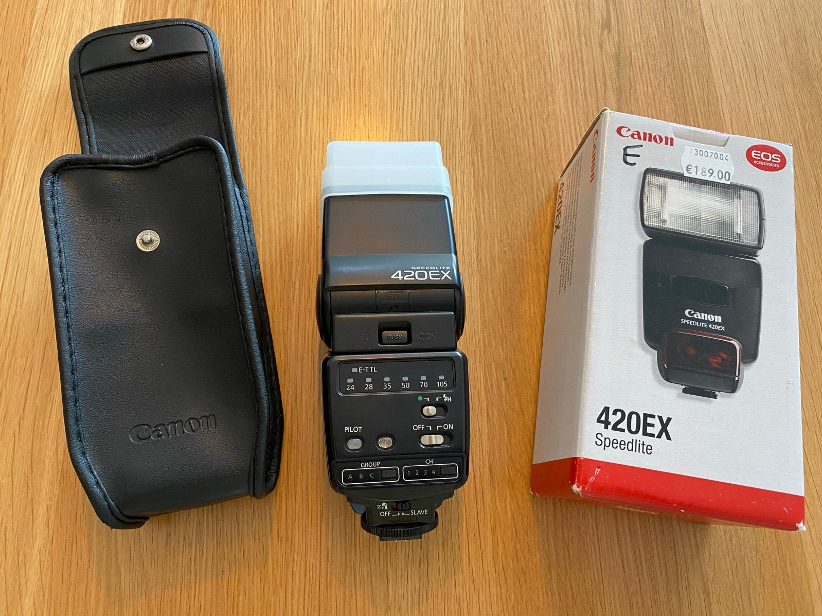 Canon Speedlite 420EX flitser met omnibounce, hoes en doos, Ophalen of Verzenden, Gebruikt, Canon, Kantelbaar