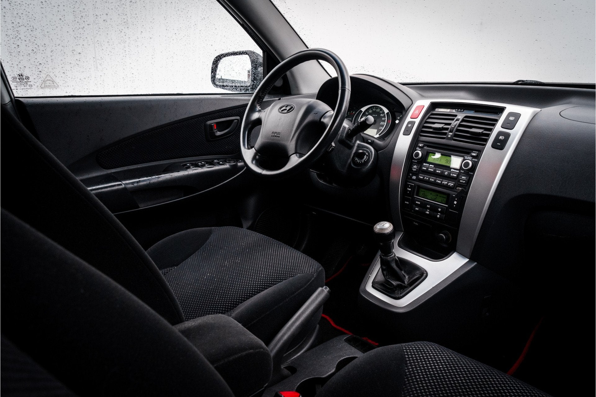 Hyundai Tucson 2.0i 142 PK Style Executive |NED Auto | Hoge, Stof, Gebruikt, Zwart, 4 cilinders