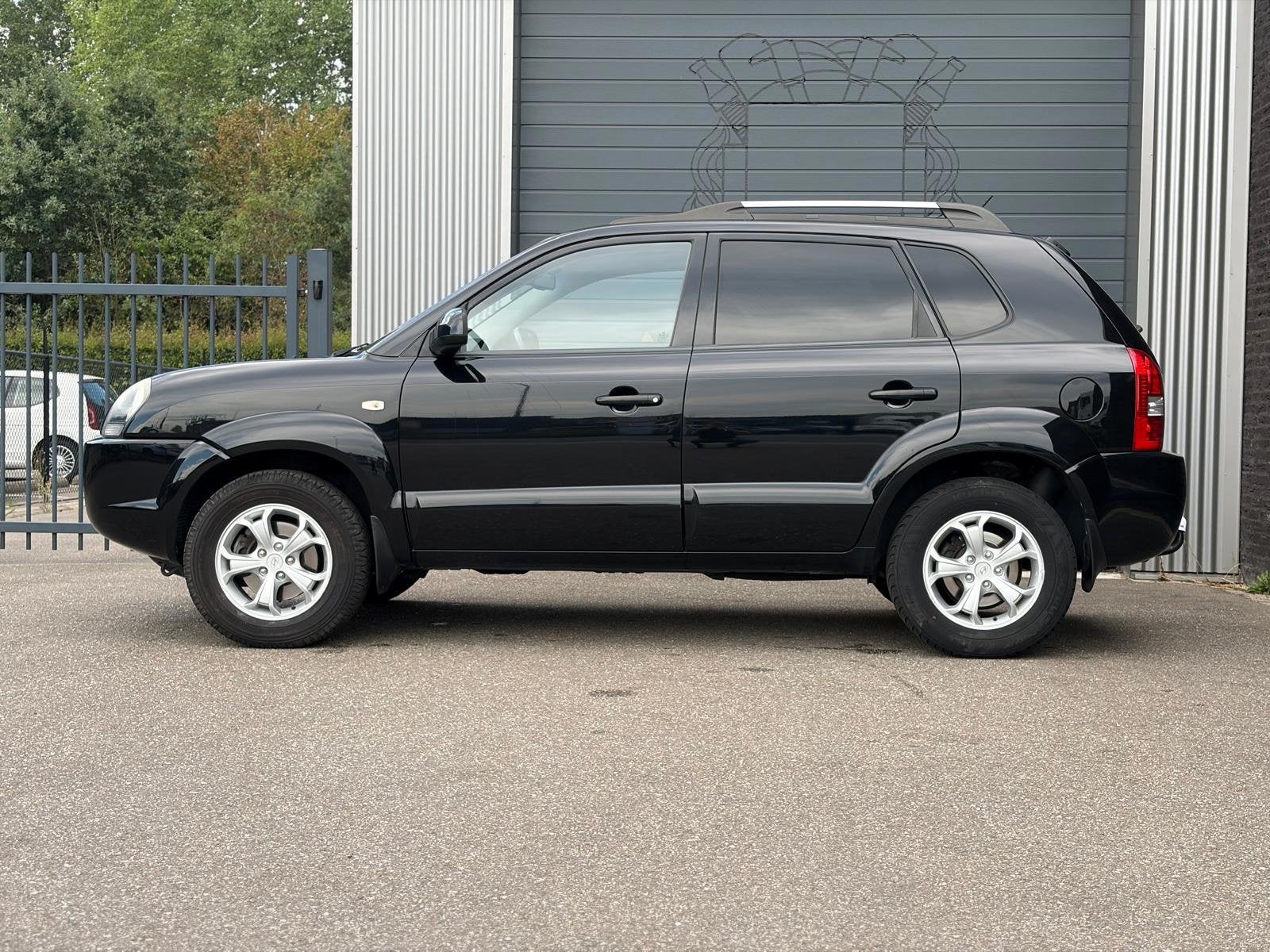 Hyundai Tucson 2.7i V6 4WD Style Automaat|Camera|Ecc, Automaat, Gebruikt, Zwart, 2656 cc