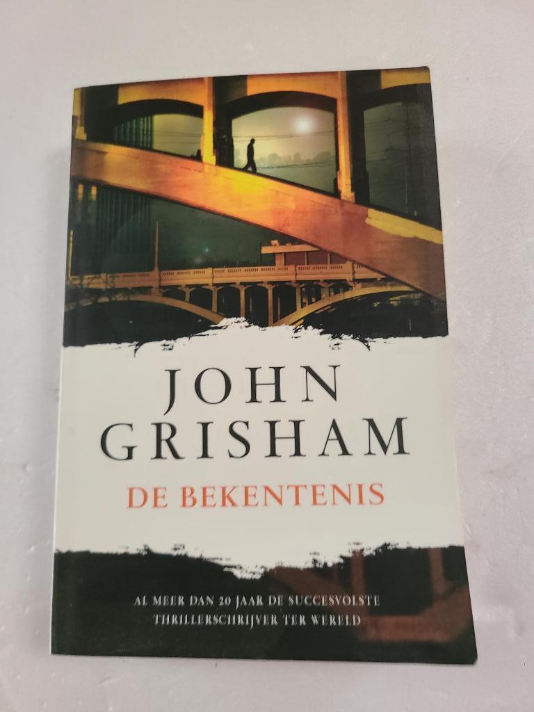 boek de bekentenis John Grisham, Boeken, Thrillers, Zo goed als nieuw, Ophalen of Verzenden