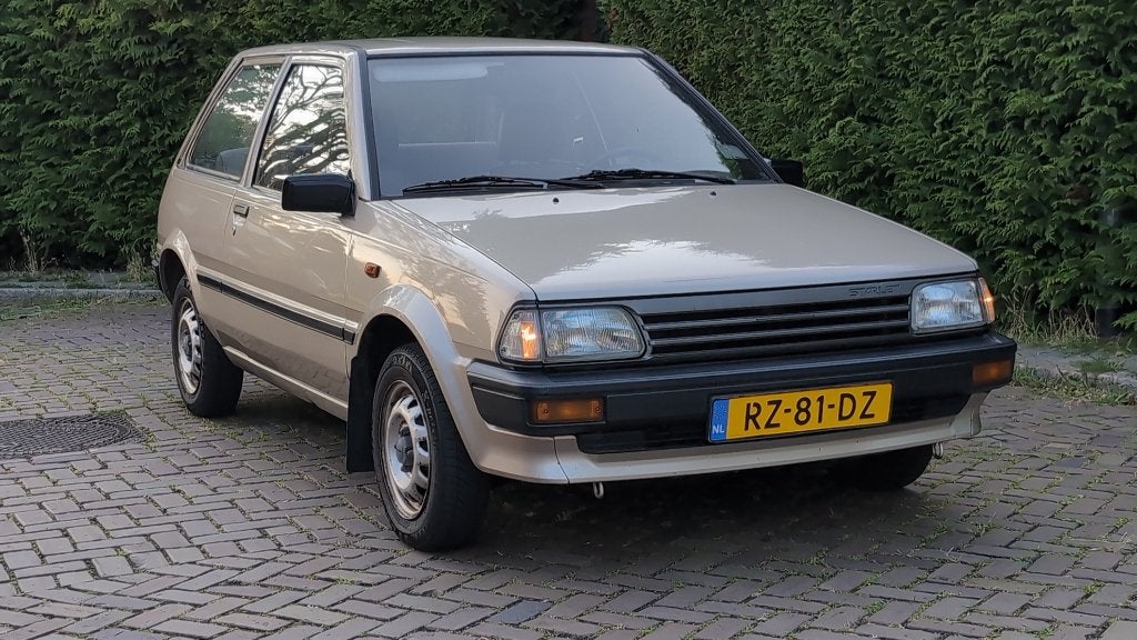 1987 Toyota Starlet 1.3 XL | NAP 147.123 km | Leuke Oldtimer, Auto's, Toyota, Stof, 74 pk, Starlet, Beige