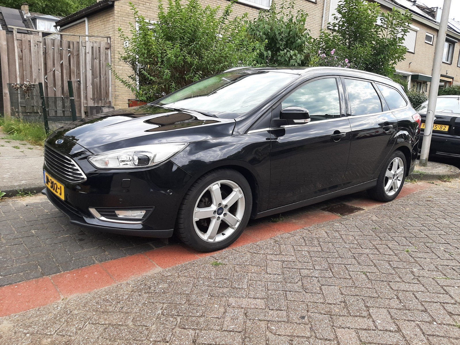 Ford Focus 1.0 Ecoboost 125pk 2015 Zwart, Auto's, Ford, 125 pk, Zwart, 4 cilinders, Leder en Stof