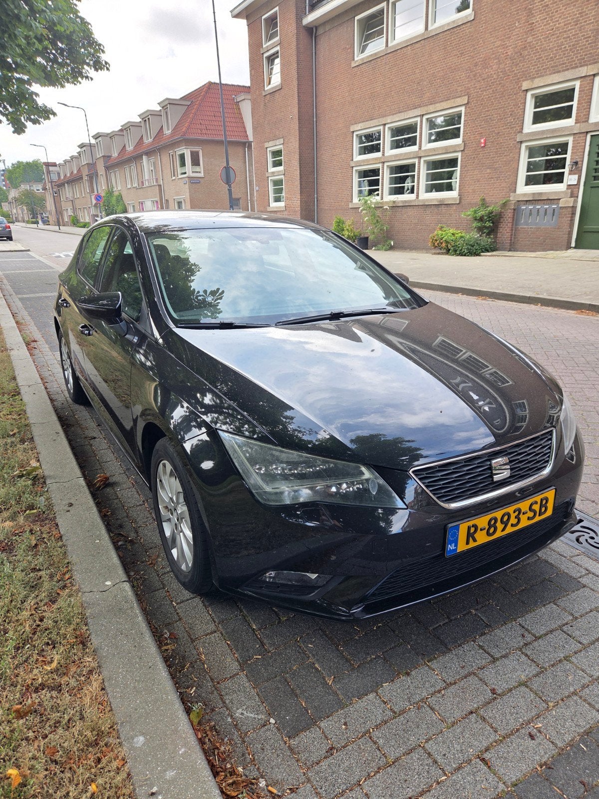 Seat Leon 1.2 TSI  Automaat + nieuwe APK, Auto's, Euro 5, Stof, Zwart, 4 cilinders