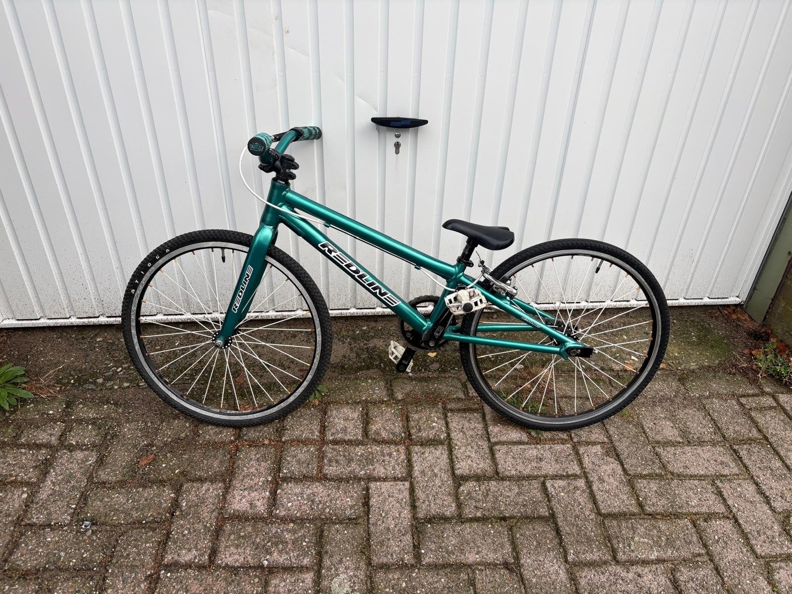 Redline mini BMX Racefiets - gebruikt, Fietsen en Brommers, Ophalen, Velgrem, Aluminium, Voetsteunen