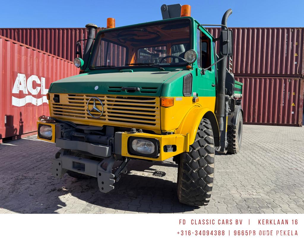 Mercedes Unimog U1300L met autolaadkraan vrachtwagenkenteken, Auto's, Gebruikt, Overige modellen, Leder en Stof, Particulier