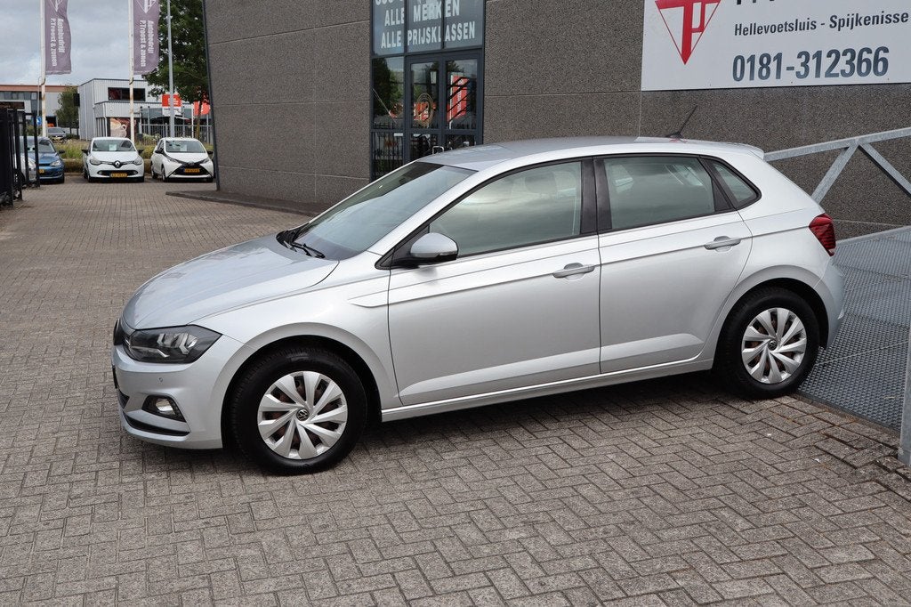 Volkswagen Polo 1.0 TSI Comfortline Nederlandse auto! Adapti, Auto's, Volkswagen, Voorwielaandrijving, 12 maanden, Gebruikt, 580 kg