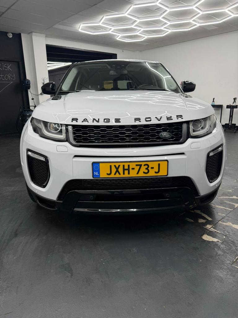 Land Rover Range Rover Evoque 2.0 Si4 240pk 4WD Aut 2016, Auto's, 13 km/l, 1800 kg, Wit, Geïmporteerd
