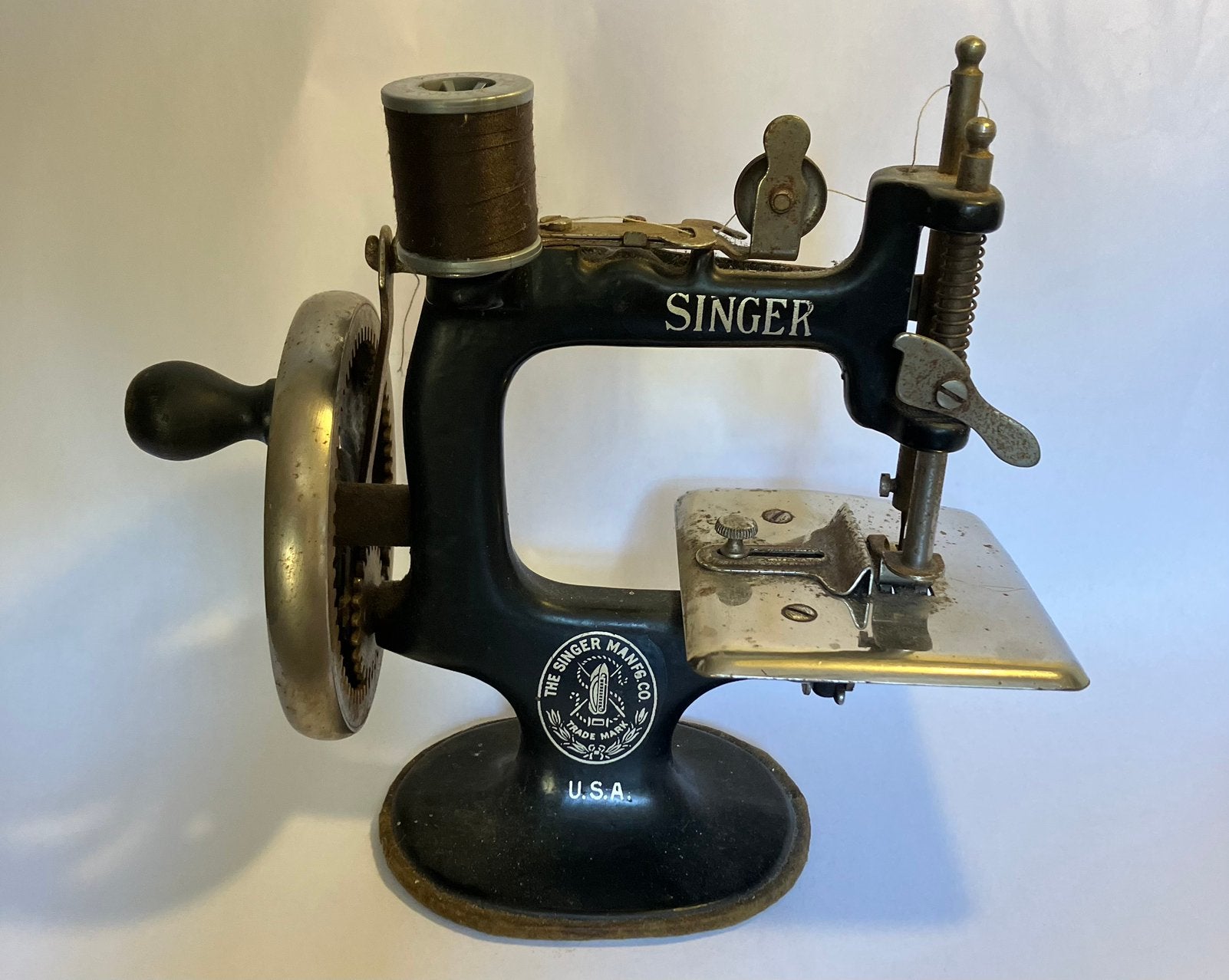 Singer model 20 speelgoed naaimachine, Ophalen