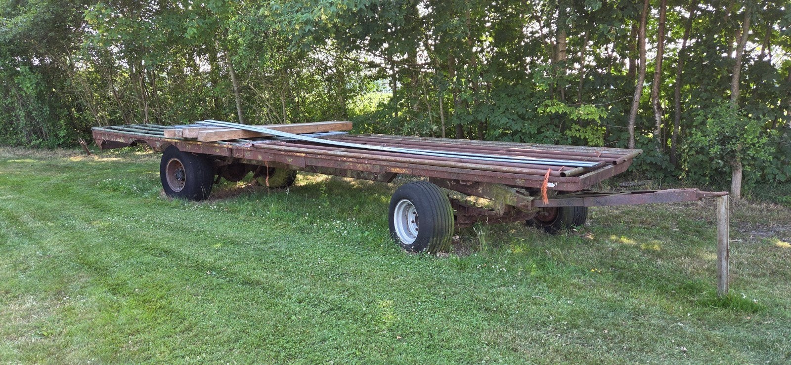 Platte wagen 2,2 x 9 meter, Ophalen