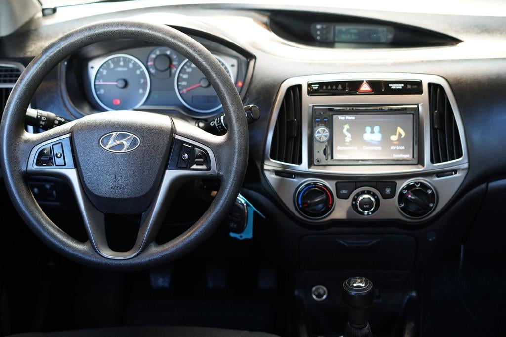 Hyundai I20 1.2i i-Motion | AIRCO | ACHTERUITRIJCAMERA | ELE, Auto's, Euro 5, Gebruikt, 31 €/maand, 4 cilinders